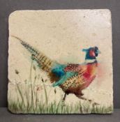 A hand painted tile of a pheasant