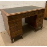 A mahogany leather topped pedestal desk AF