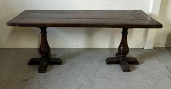 An oak Elizabethan style refectory table (H74cm W182cm D75cm)