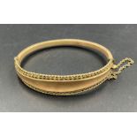 A 9ct gold bracelet with safety chain (Approximate Total weight 13)