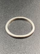 A platinum wedding band (Approximate Weight 2.8g) (Size K)