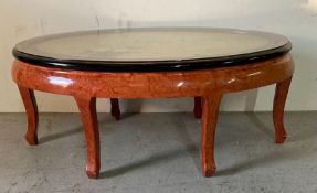 A Chinese coffee table with a glass top circa 1980's (H54cm W125cm D75cm)