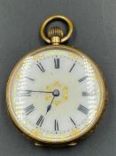 An ornate ladies pocket watch in 14ct gold