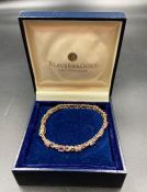 A 9ct gold bracelet with semi precious stones (Approximate Total weight 8g)