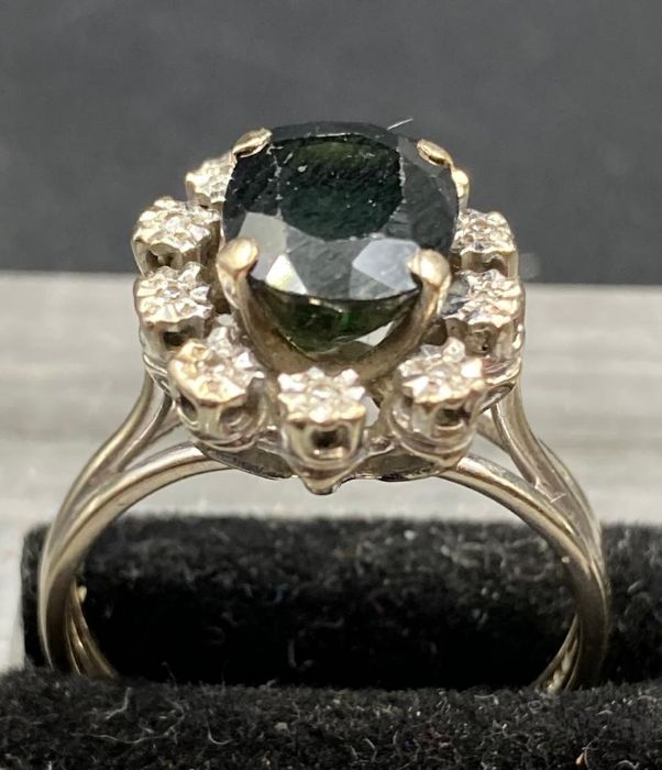 An emerald and diamond ring set in and 18ct white gold setting. (Size O) - Image 3 of 4