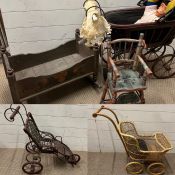 A selection of vintage style dolls prams and cots