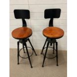 A pair of industry style bar stools