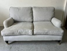 A two seater sofa (H80cm W150cm D95cm)