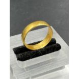A 22ct gold wedding band (Approximate Total weight 4.5g) Size O