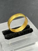 A 22ct gold wedding band (Approximate Total weight 4.5g) Size O