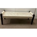 A contemporary woven rope bench/window seat (H56cm W150cm D54cm SH47cm)