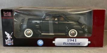 A Yat Ming Diecast model of a 1941 Plymouth