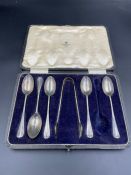 A part silver teaspoon set, six piece set with sugar tongs, missing one spoon by James Dixon &