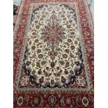 An Isfahan Persian carpet, signed (330cm x 206cm)