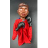 A vintage Cassius clay Mohamed Ali boxer toy