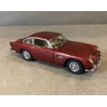 A Franklin Mint Diecast model of an 1964 Aston Martin