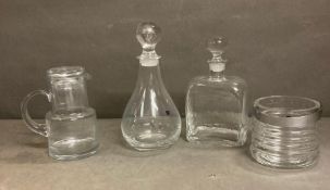 A selection of four items of Darlington glassware to include decanters, ice bucket and a water jug