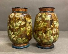 A pair of Lambeth Doulton Faience stoneware vase, approximately 16 cm High.