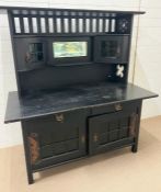 A black oak sideboard with gallery back and pieced sides (H165cm W150cm D73cm)