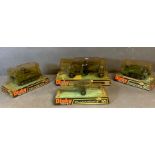 A selection of four boxed military Dinkey toys