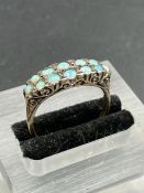An Opal ring on an untested gold setting Size S