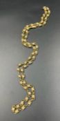 A 9ct gold necklace (Approximate Total weight 49g) with knotted rope theme.