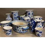 A selection of blue and white china to include jugs, vases etc