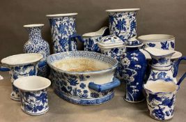 A selection of blue and white china to include jugs, vases etc