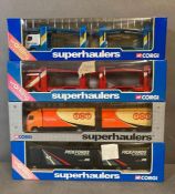A selection of four boxed Corgi lorries to include car transporter, Pickford's and TNT