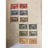 A stamp album with Commonwealth stamps