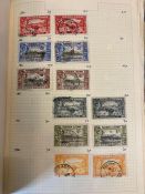 A stamp album with Commonwealth stamps