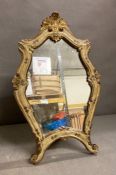 A wooden framed painted dressing table mirror
