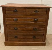 A mahogany two over three chest of drawers with distress metal grab handles (H100cm D50cm W105cm)