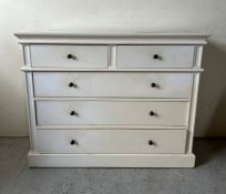 A white chest of drawers with brass handles (H91cm W114cm D42cm)