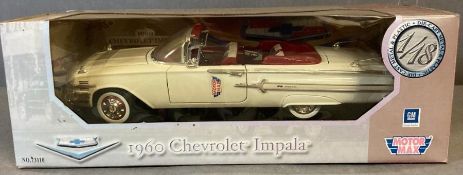 A motor Max Diecast model of a 1960 Chevrolet Impala