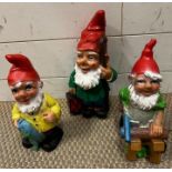 Three working garden gnomes