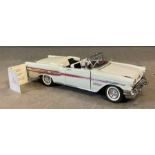 A Franklin Mint Diecast model of a 1957 Pontiac Bonneville