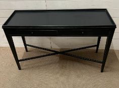 A black console table with cross stretchers and square tapering legs (H78cm W120cm D40cm)