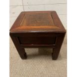 A square hardwood side table (H34cm Sq33cm)