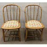 Two pine stick back chairs