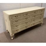 A Louis style three over six drawers with glass top (H75cm W140cm D44cm)
