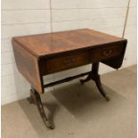 A flame mahogany two drawer drop leaf sofa table on lion paw feet finishing on castors (H77cm