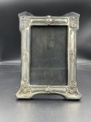 An easel back silver photo frame, Art Nouveau in style by J Aitkin & Son Birmingham 1908.