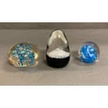 Three paperweights to include Caithness Eagle