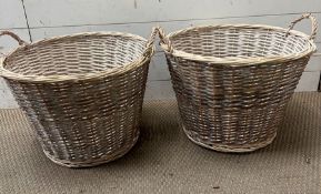 Two wicker handled log baskets