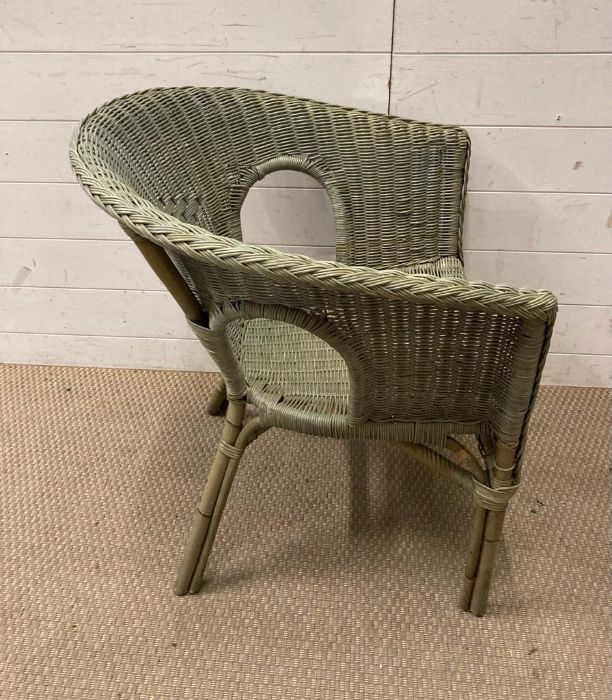 A green Lloyd chair