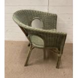 A green Lloyd chair