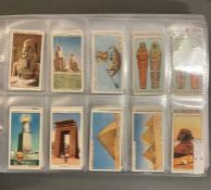 Four albums of Wills cigarette cards to include roses, beautiful homes and railway engines