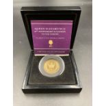 A Queen Elizabeth II 65th Anniversary Accession to The Throne 9 ct gold double crown (4g)