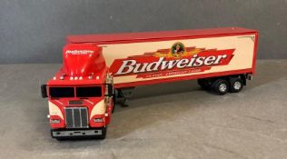 A Matchbox Ultra Diecast model of a Budweiser truck and trailer